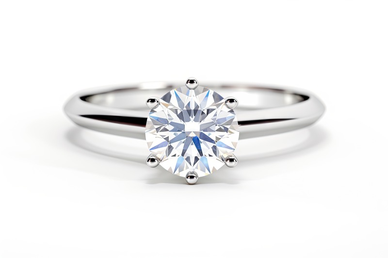 Solitaire diamond engagement ring isolated on white